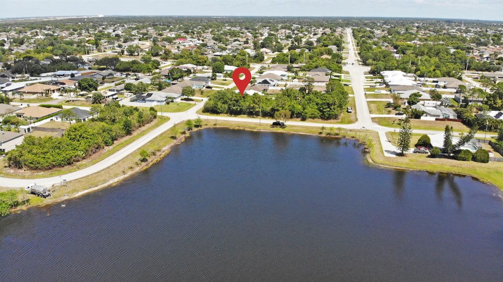 Photo of 1129 SW Edinburgh Drive, Port Saint Lucie, FL 34953 (MLS # R10980001)