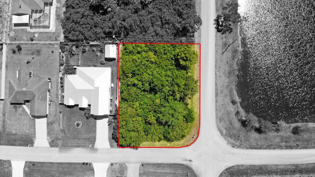 Photo of 1129 SW Edinburgh Drive, Port Saint Lucie, FL 34953 (MLS # R10980001)