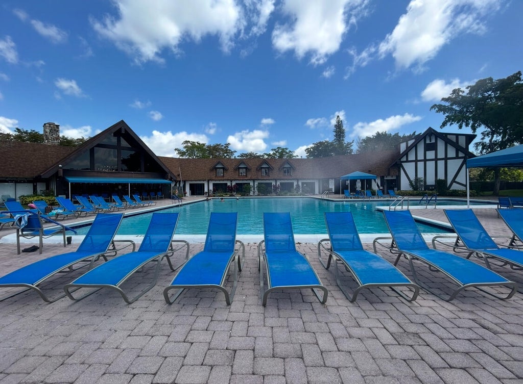 Photo of 3660 Inverrary Drive #1b, Lauderhill, FL 33319 (MLS # B26039346)