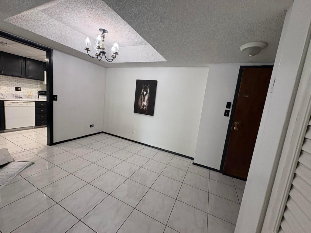 Photo of 3660 Inverrary Drive #1b, Lauderhill, FL 33319 (MLS # B26039346)