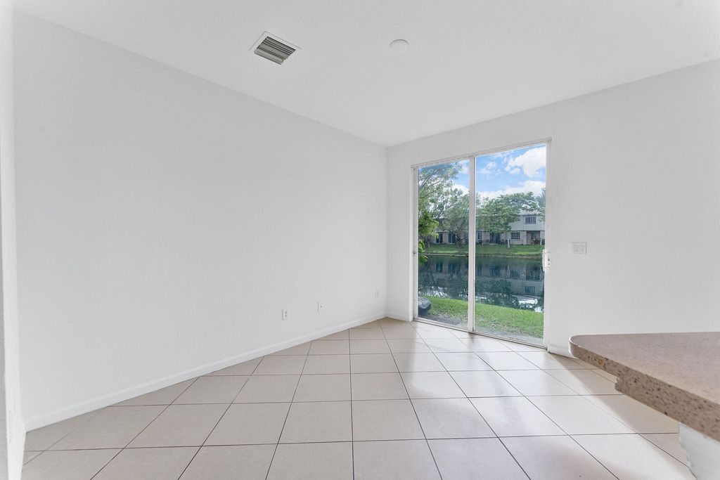 Photo of 995 Abaco Lane, Riviera Beach, FL 33404 (MLS # B26010822)