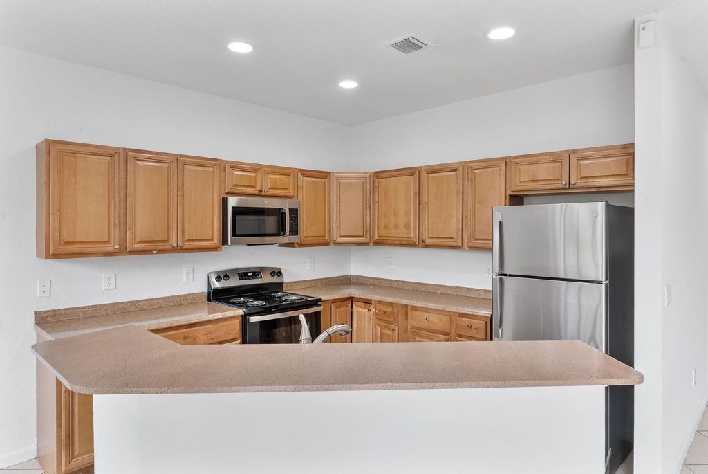 Photo of 995 Abaco Lane, Riviera Beach, FL 33404 (MLS # B26010822)