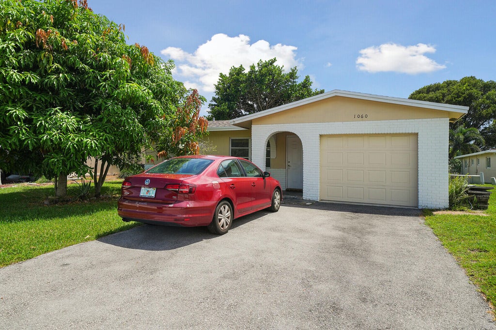 Photo of 1060 NW 49th Court, Deerfield Beach, FL 33064 (MLS # B26071822)