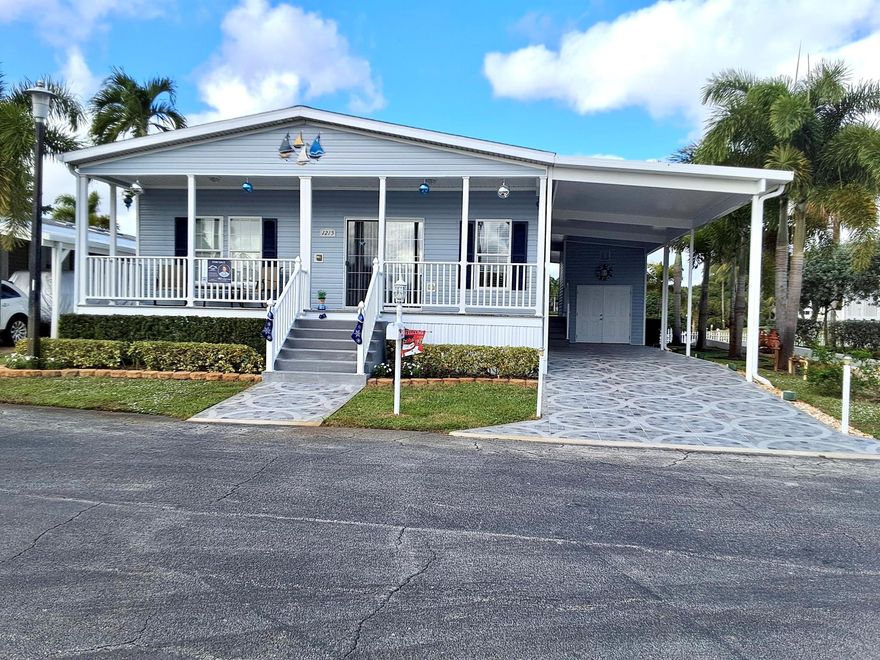 Rare on the Market - Stunning Waterfront Property Located directly on the canal by the marina, with the possibility of having your own dock. This beautiful home features 2 spacious bedrooms and 2 elegant bathrooms. The open-concept layout connects the living room, kitchen, and dining area seamlessly. This residence is move-in ready.