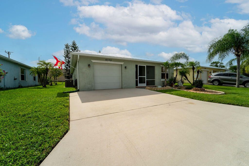 Photo of 6735 Dulce Real Avenue, Fort Pierce, FL 34951 (MLS # R10928664)
