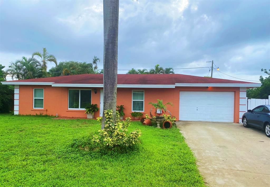 Photo of 6845 Osborne Drive Dr, Lake Worth Beach, FL 33462 (MLS # R10730976)