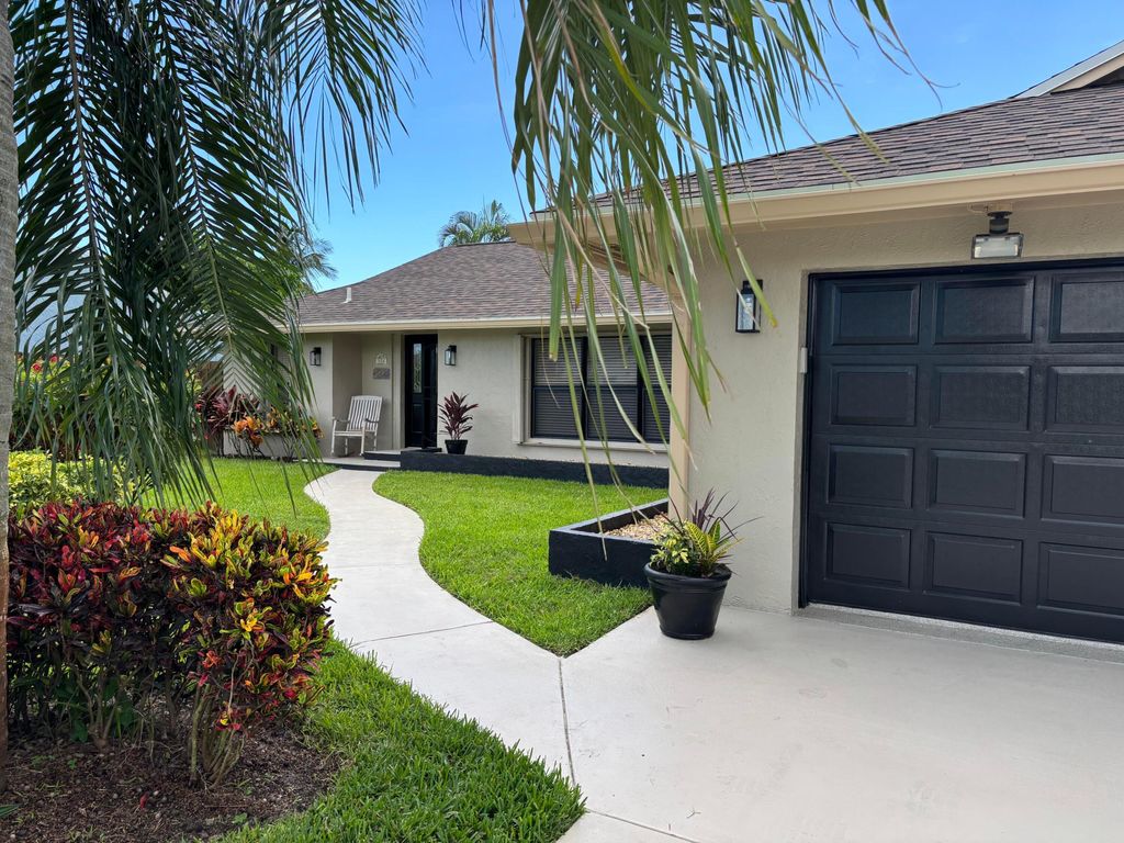 Photo of 326 NE Surfside Avenue, Port Saint Lucie, FL 34983 (MLS # R11102281)