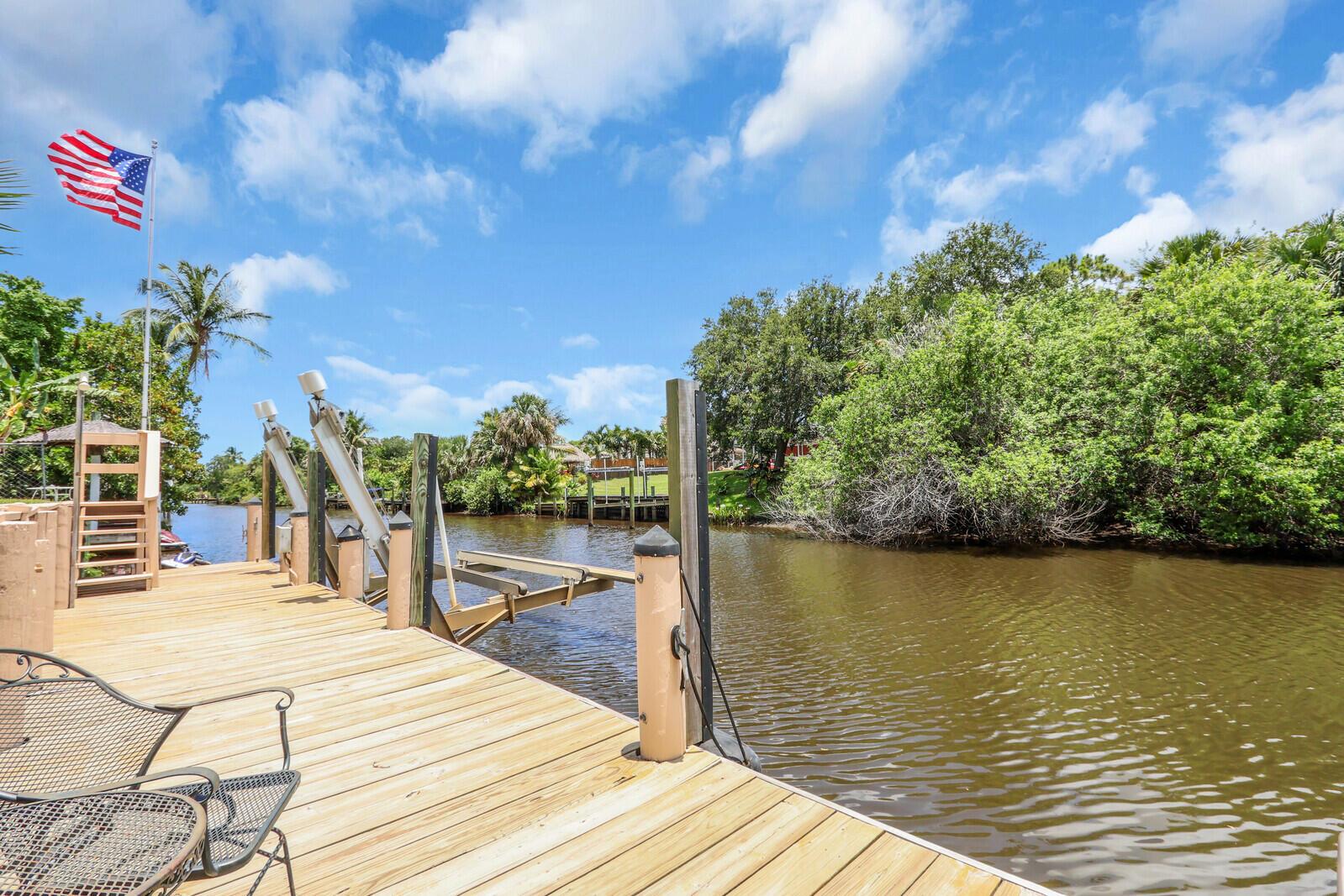 Welcome to Florida living at it's Finest! CBS Home, Ocean Access, Caged Salt Water Pool, Solar heated with big Covered Lania and large Dock with 10k lb Boat Lift. This home has been well taken care of and is looking for a new family to enjoy it. The home is move in ready, just bring your family and toys and enjoy your own Paradise.Too many extras to list! Must see to appreciate.