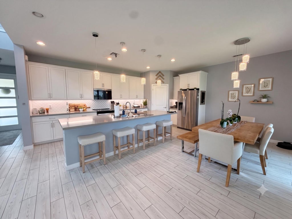 Photo of 8798 ANTARUS Drive, Lake Worth, FL 33467 (MLS # B26076671)
