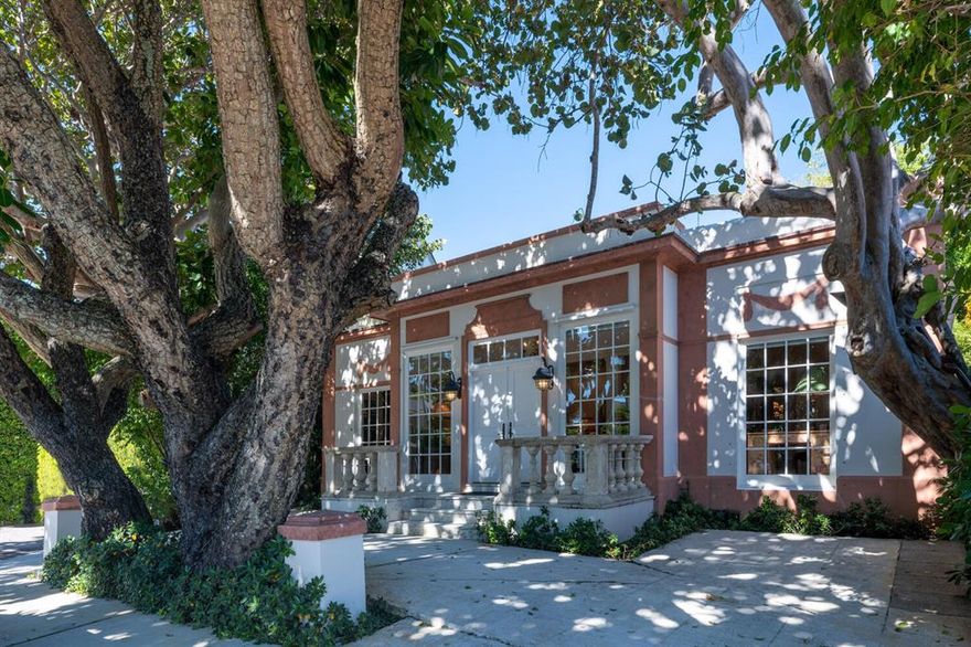 For anyone who's ever said, ''I'd love to find a charming little house in town'', this is the one. Elegant 1920's architecture, 10' ceilings. a renovated kitchen and an inviting living room centered on a grand, oversized fireplace. Two bedrooms, two baths in the main house plus a one bedroom suite guest cottage overlooking the garden. All this on a dead-end, one-way street, just 50 yards from the Four Arts library and sculpture garden. Neighborhood beach access at the ocean end of Seaspray Avenue, and an easy stroll via the adjacent Lake Trail to Worth Avenue and Royal Poinciana shops and restaurants.