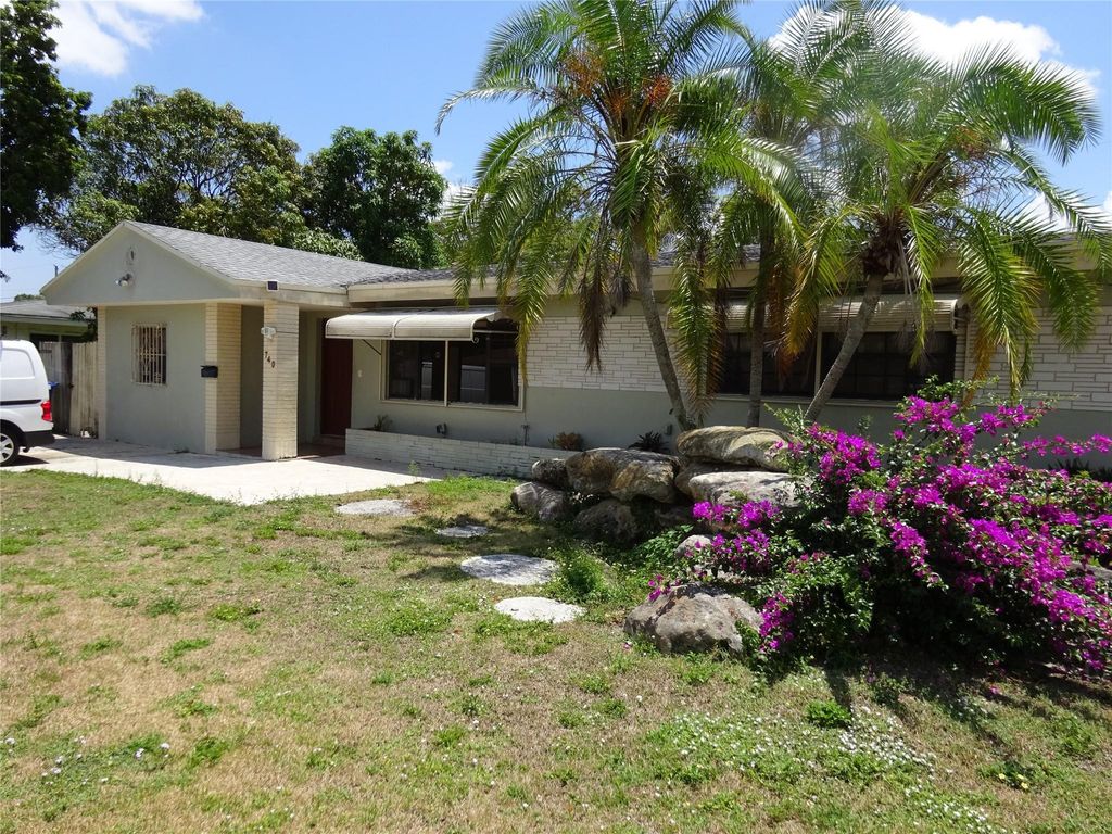Photo of 740 E Evanston Circle E, Fort Lauderdale, FL 33312 (MLS # B26044108)