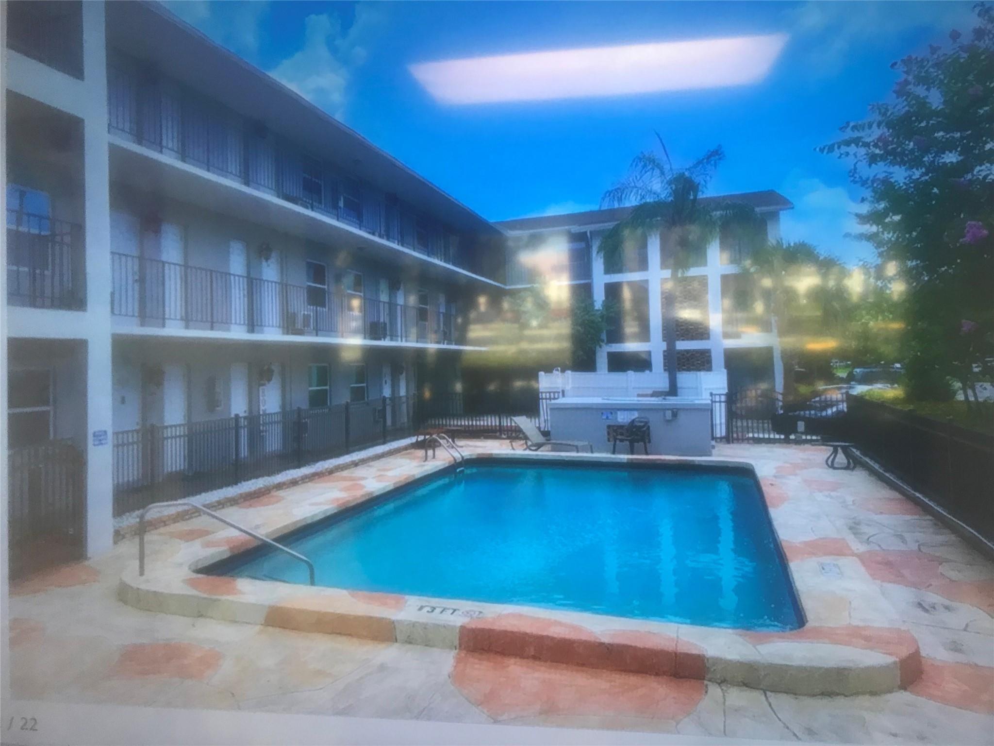Great opportunity for Handy person or someone looking for a steal, listed way under market value. Unit cleaned out & ready for remodel. Perfect location east of federal, close to beach, restaurants & shopping. Attention investors no waiting to rent Cool off in the nearby pool. HURRY THIS WILL NOT LAST!!!!!