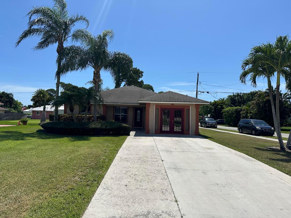 Photo of 5753 SE Mercedes Avenue, Stuart, FL 34997 (MLS # R11004872)