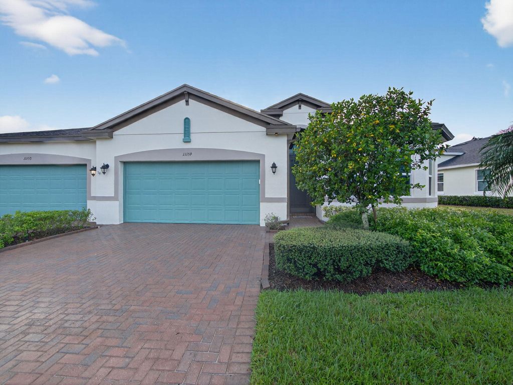 Photo of 11159 SW Winding Lakes Circle, Port Saint Lucie, FL 34987 (MLS # R11109983)