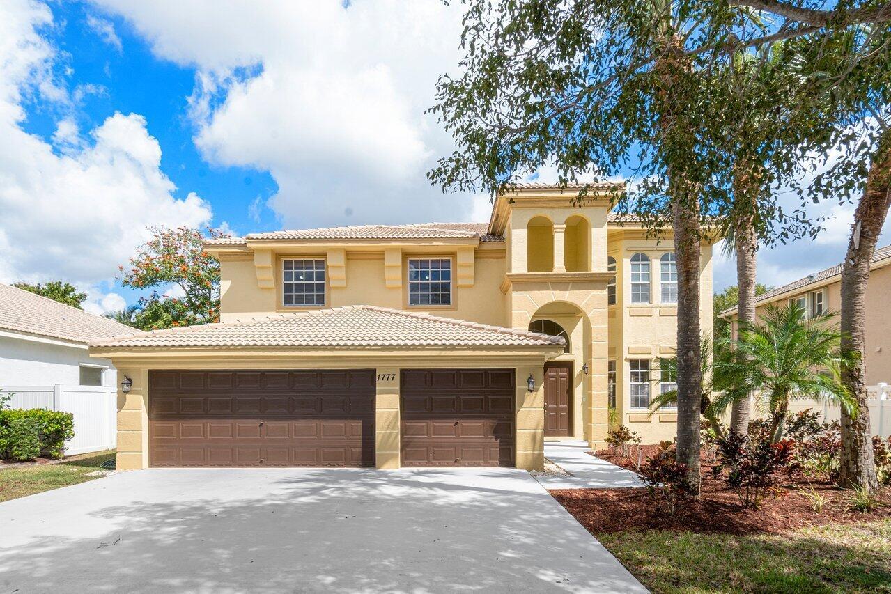 Discover opulence in this expansive five-bedroom, three-bathroom haven with a three-car garage, nestled in a secure gated community. Indulge in amenities including main and kid pools, a playground, fitness center, and golf. Ideally situated, mere minutes from Equestrian activities, Shopping, Dining, Downtown City Place, Worth Avenue, Downtown PGA, and breathtaking beaches. This home combines luxury and location for an unparalleled living experience. Your dream residence awaits in this oasis of comfort and convenience.
