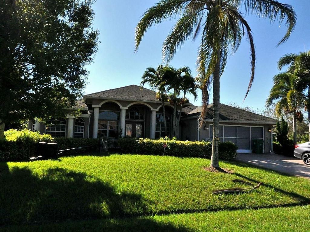 Photo of 598 SW Baoy Avenue, Port Saint Lucie, FL 34953 (MLS # R10957368)