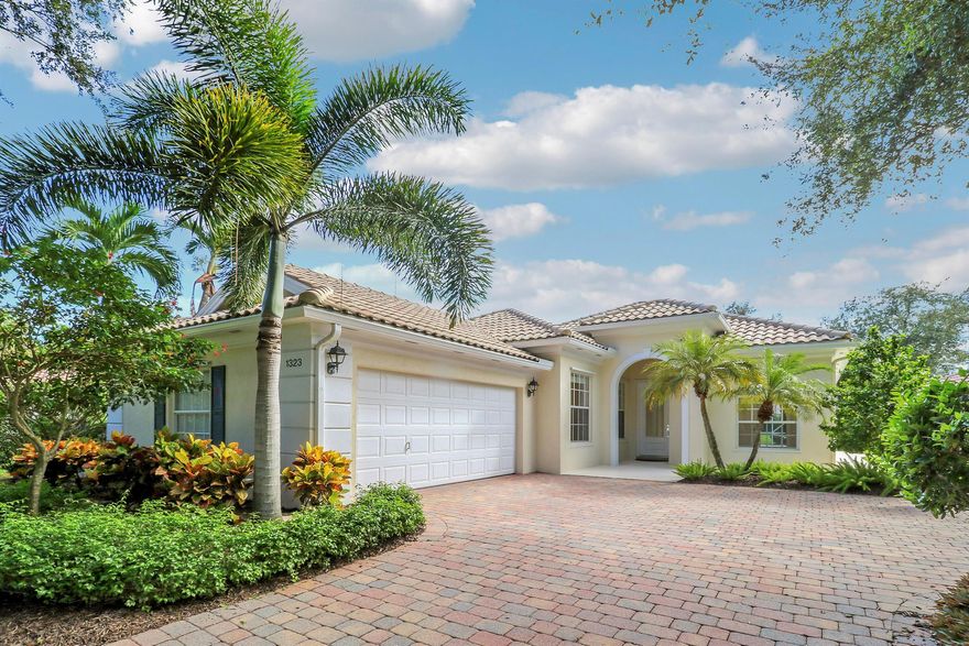 Beautiful home in The Isles of Palm Beach Gardens meticulously maintained by one owner! The solid concrete DiVosta built home  features 3 bed+den, 2.1 baths, with tasteful updates throughout! Enjoy stunning sunsets and long lake views from the expansive screened-in patio, large enough to accommodate a pool and perfect for entertaining or relaxing by the water in your serene backyard setting. With its fantastic location near world-class dining, shopping, golf, beaches, and major highways, this pristine property combines quality, comfort, and convenience in one of Palm Beach Gardens' most sought-after communities. The Isles offers resort-style amenities incl. heated pool, fitness center and pickleball courts.  HOA incl. lawn maintenance, cable / internet, and ADT home security monitoring!