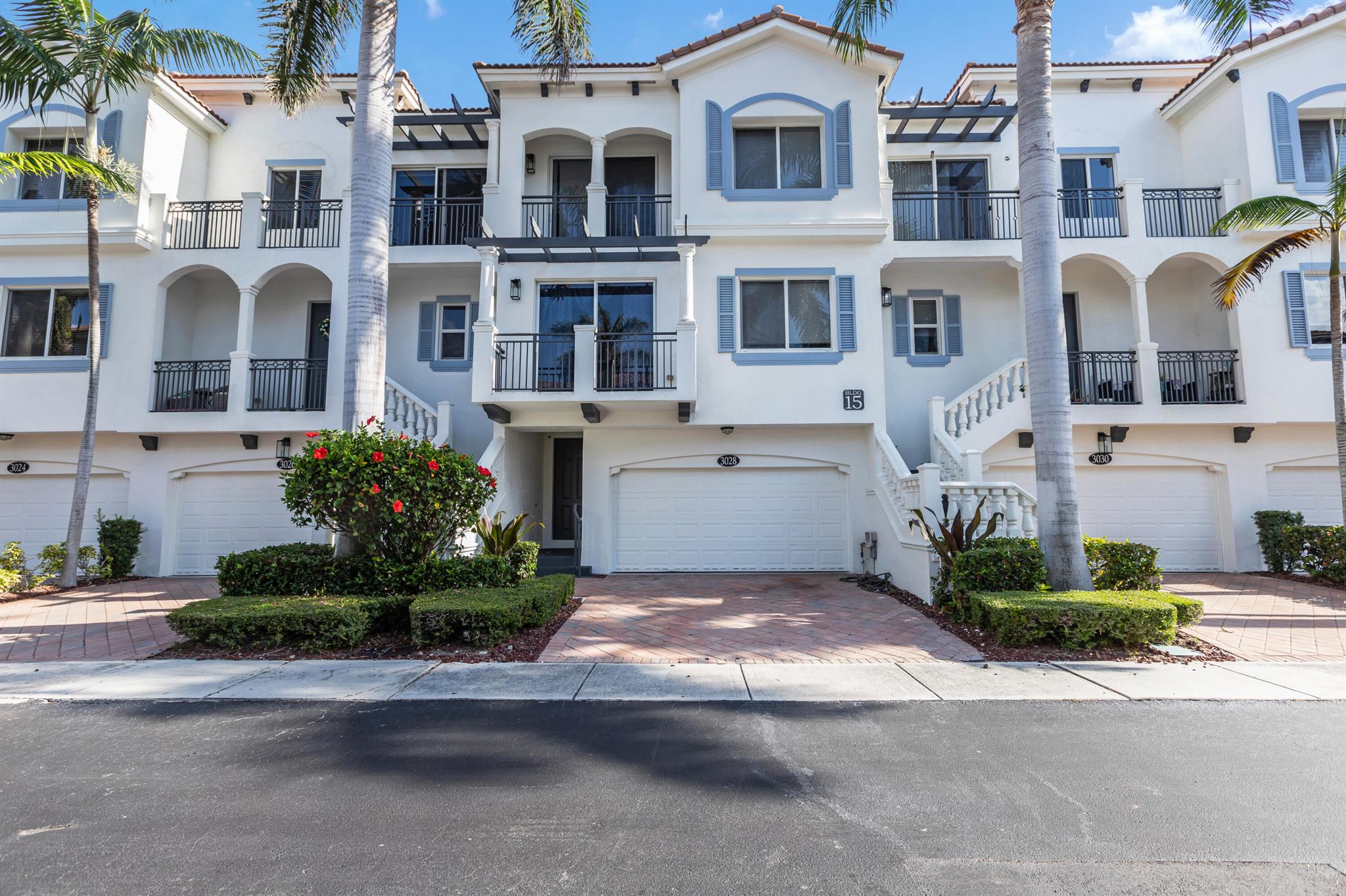 Introducing ''Waterside'' -- a blend of coastal elegance and luxurious living in a gated community, located in the scenic area of Boynton Beach along the Intracoastal Waterway. This exquisite 4-bedroom, 3.5-bathroom Mediterranean townhome offers an exceptional rental opportunity.Step inside to discover a meticulously landscaped environment with high-end amenities and numerous upgrades. The home features balconies with serene views, extending from the dining room to the bedrooms. The open-concept kitchen is equipped with stainless steel appliances and a spacious pantry, while the master suite includes a walk-in closet and a lavish bathroom with dual sinks, a separate shower, and a jacuzzi tub.