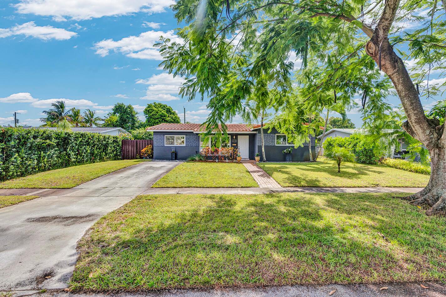 Discover this beautiful 3 bedroom, 2 bathroom single family home in the heart of Hollywood, FL. This home is sitting on a spacious lot with a large backyard, with plenty of room for entertaining, pets, gardening, or even a future pool. Inside, you'll find a functional layout with generous living spaces. Impact windows for added safety, a new AC and hot water heater. Conveniently located near parks, schools, shopping, and just minutes away from the beach.