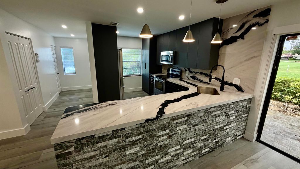 Photo of 21695 Tall Palm Circle #4a, Boca Raton, FL 33433 (MLS # B26030123)