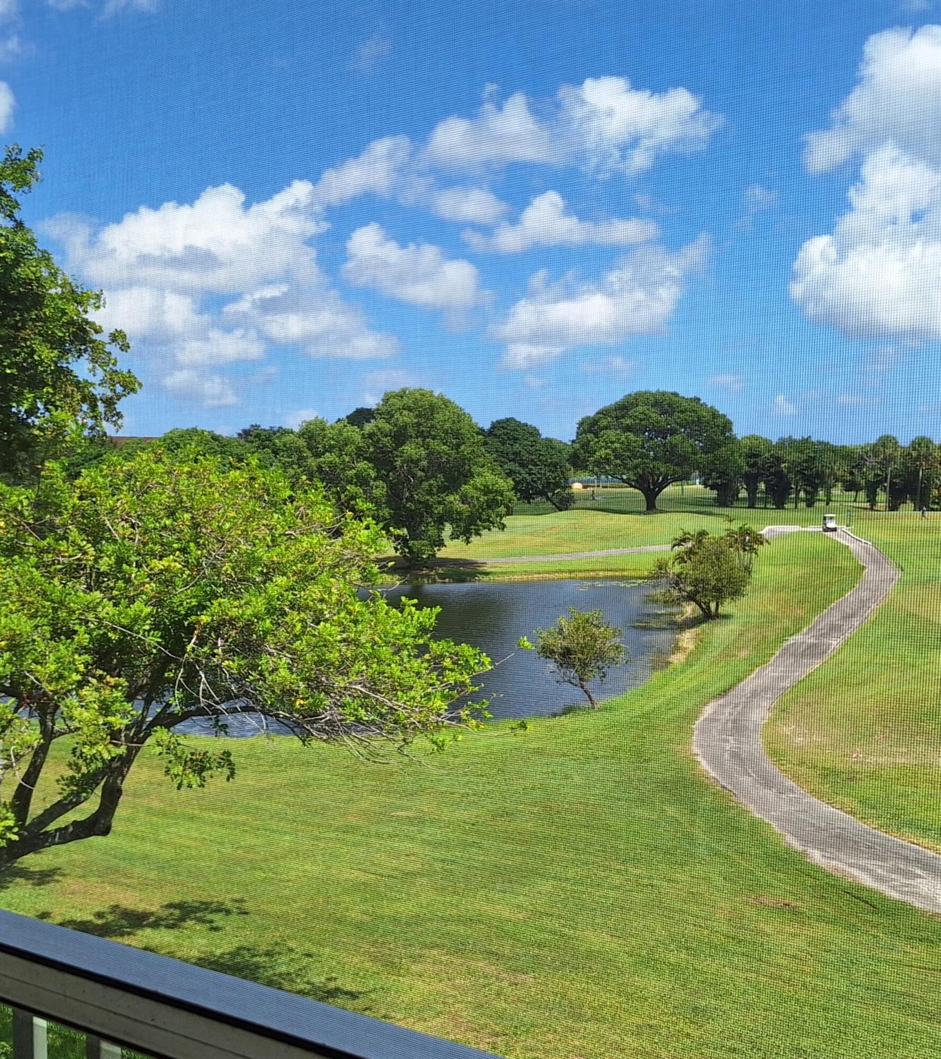 PRICE REDUCED!!! Bright, spacious 2 bed 1.5 bathroom condo in Hampton G. Beautiful, peaceful setting with the lanai overlooking both the gardens and the waterways. Original owner from 1985 - ready for you to make it your own! Brand new A/C and new laminate floors. Close to the clubhouse and houses of worship. Come see the spectacular clubhouse and the multiple amenities in this 55+ community. Can be leased right away & no assesment.