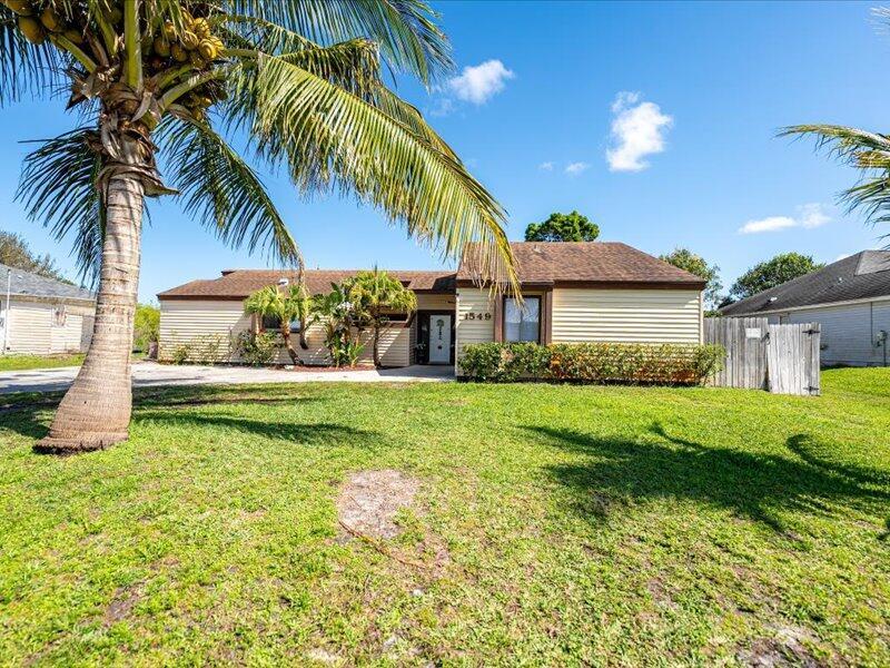 Charming 3 bedroom 2 bath pool home available. Vaulted ceilings welcome you to the spacious living area that looks out to a private fenced yard and refreshing pool. Conveniently located near shopping centers, dining establishments, and recreational facilities, this home offers easy access to everyday essentials. Set in a friendly and established neighborhood, 1549 SE Croquet Street provides a sense of community and belonging. Don't miss the opportunity to own this Port Saint Lucie gema"schedule your showing today! Roof 2019.