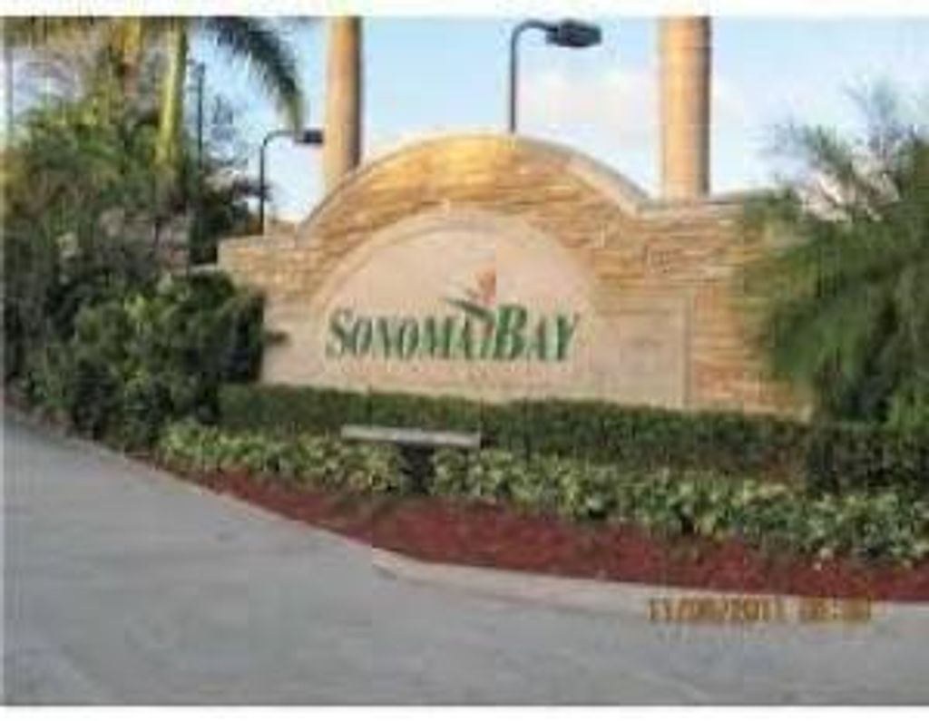 Photo of 1938 Hibiscus Lane, Riviera Beach, FL 33404 (MLS # R10813258)