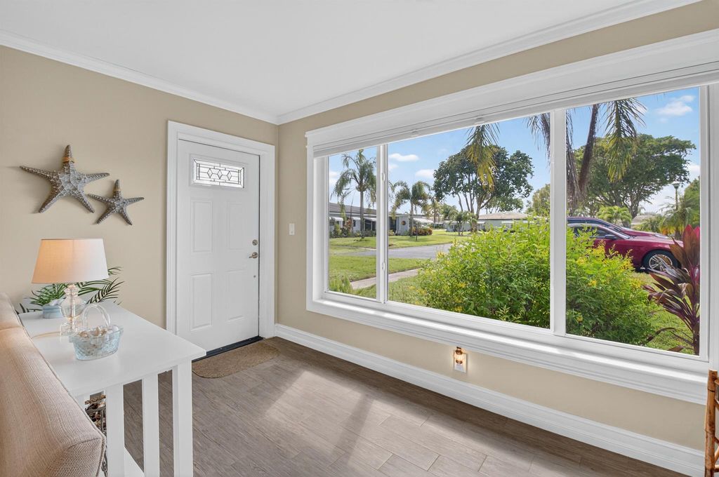 Photo of 557 High Point Drive #C, Delray Beach, FL 33445 (MLS # R11133983)