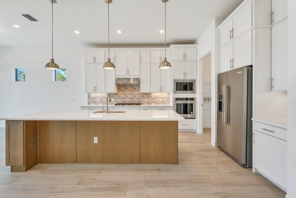 Photo of 10358 Northbrook Circle, Palm Beach Gardens, FL 33412 (MLS # R10973951)