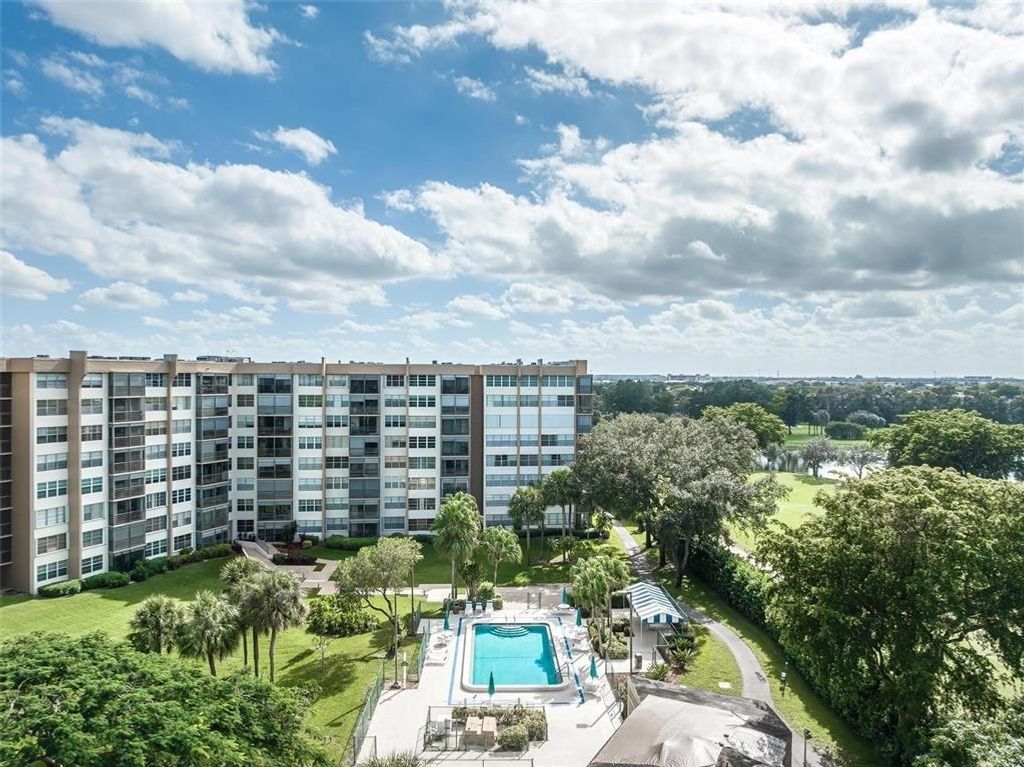 Photo of 900 Saint Charles Place #415, Pembroke Pines, FL 33026 (MLS # F10420793)