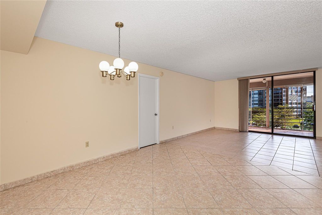 Photo of 900 Saint Charles Place #415, Pembroke Pines, FL 33026 (MLS # F10420793)