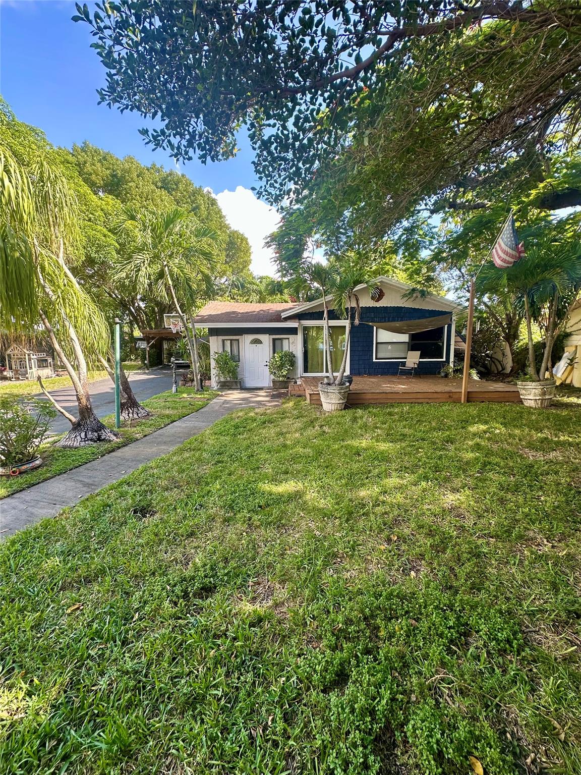 Fully remodeled custom large 2/1 East of US1 on huge lot. Custom kitchen with natural gas range and quartz countertops. Extra Large bathroom with soaking tub and luxury finishes. Real hard wood floors throughout. Crown Molding. House sits on a 1/2 acre lot providing privacy from other tenants. Large front wooden deck. Outside storage available. The entire lot is fenced in for maximum privacy and security. High end Washer and Dryer in unit. Quiet neighborhood less than 2 miles to the ocean. Lawn care and pest care included in rent with a flat rate for electric and water. Unbeatable location within minutes of beach, airport, Publix, Casino, major highways.a unique property that you won’t find anywhere else.