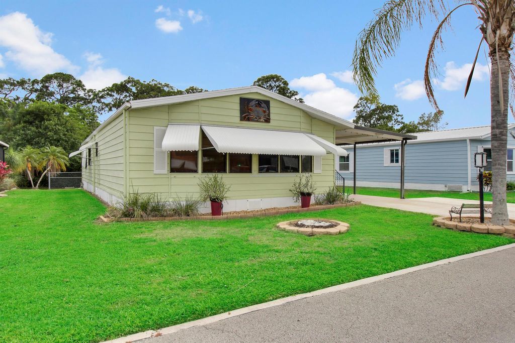 Photo of 8601 Florence Drive, Port Saint Lucie, FL 34952 (MLS # R10885069)