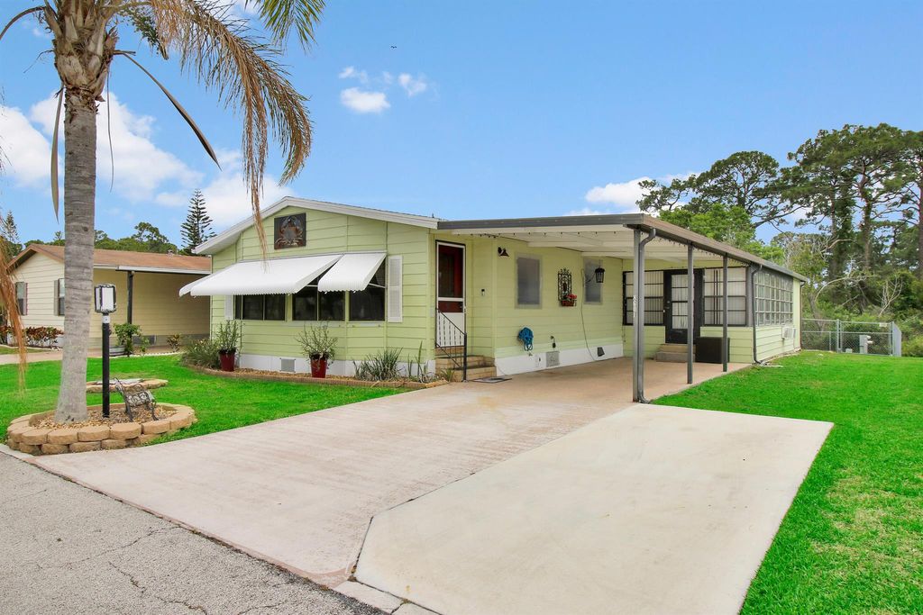 Photo of 8601 Florence Drive, Port Saint Lucie, FL 34952 (MLS # R10885069)