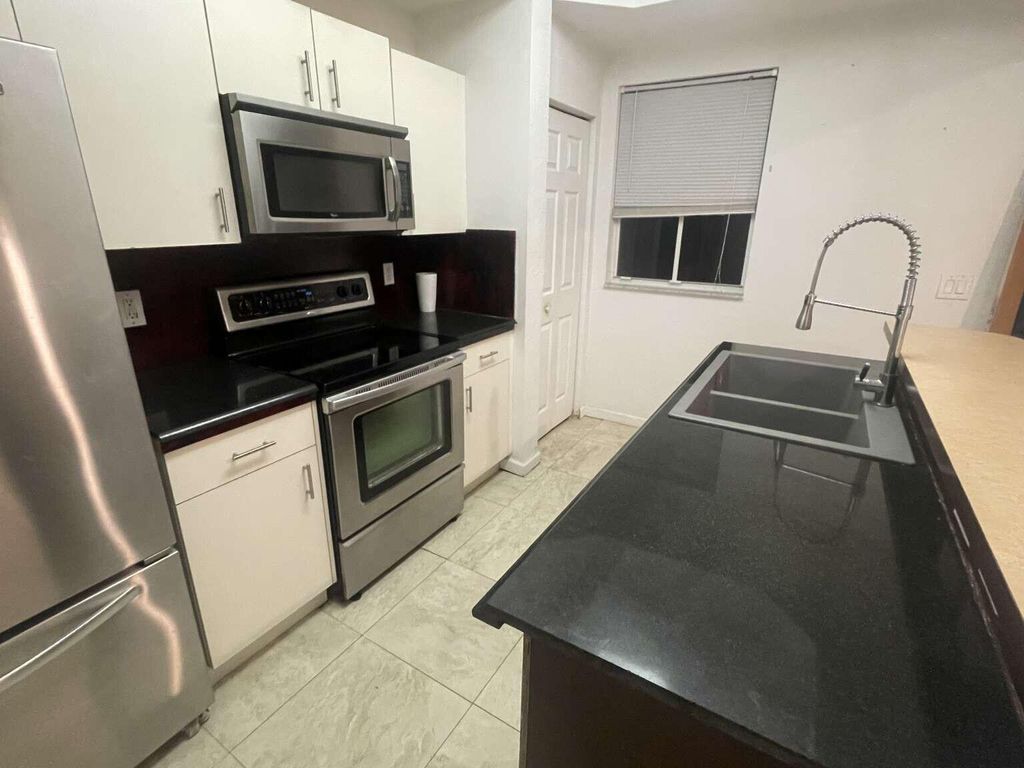 Photo of 2944 Hidden Hills Road #1604, West Palm Beach, FL 33411 (MLS # B26006275)