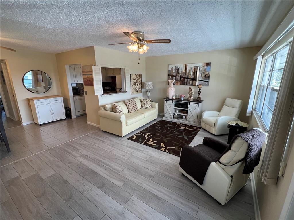 MOVE RIGHT INTO THIS ADORABLE CONDO, SUPER CLEAN, FURNISHED AND READY FOR ITS NEW OWNERS! GREAT LOCATION, BUILDING IS ACROSS FROM THE POOL! GRANITE COUNTERTOPS, NEW FLOORS, NEW BATHROOMS, NEW ELECTRICAL PANEL! PATIO OVERLOOKS A GARDENVIEW...COME SIT BACK AND RELAX AND ENJOY FLORIDA LIVING!! ASSOCIATION CLAIMS 55+ CENTURY VILLAGE HAS RESORT STYLE AMENITIES TO INCLUDE A THEATER, INDOOR AND OUTDOOR POOLS, RESTAURANT, CLUBHOUSE, PICKLEBALL, TENNIS, VOLLEYBALL, GAME ROOMS, ACTIVITIES, PUTTING GREEN, COURTESTY SHUTTLE AND SO MUCH MORE.