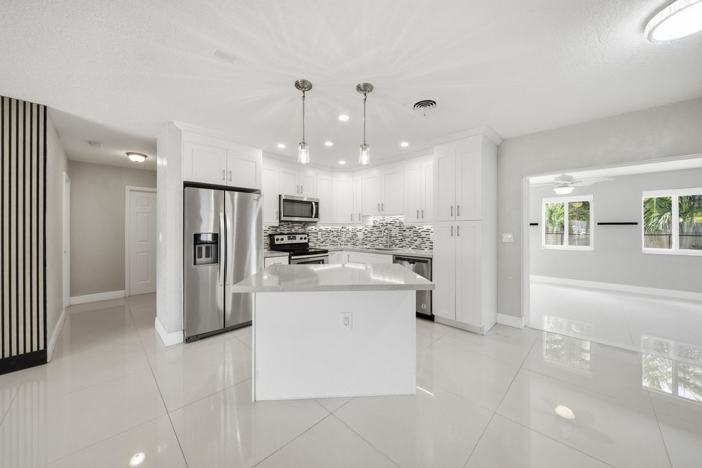 Photo of 5031 NE 23rd Terrace, Lighthouse Point, FL 33064 (MLS # B26015435)