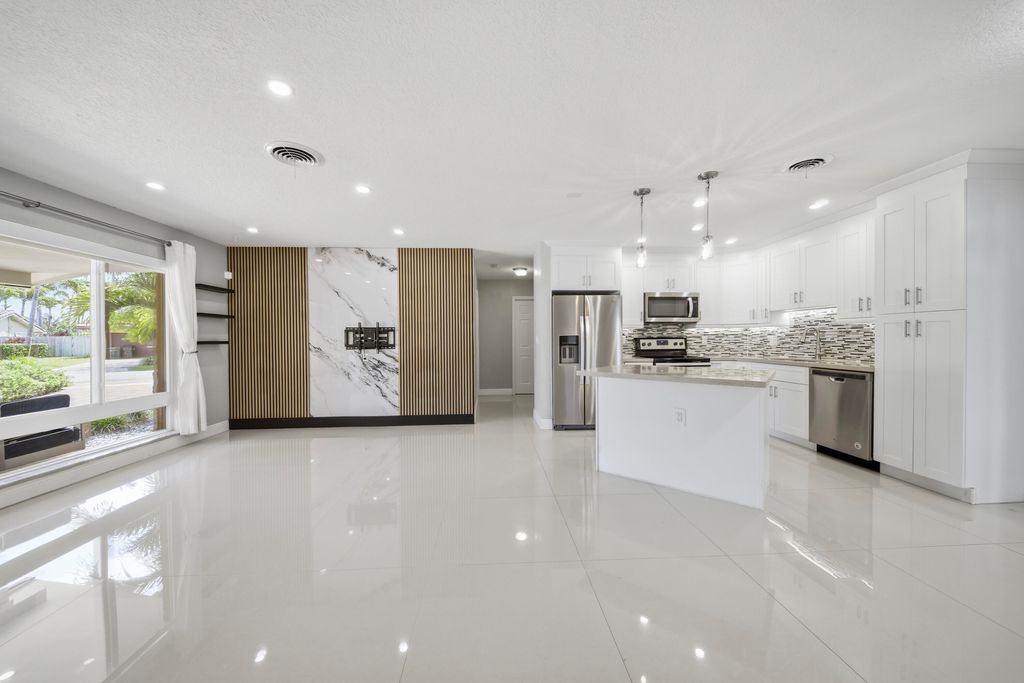 Photo of 5031 NE 23rd Terrace, Lighthouse Point, FL 33064 (MLS # B26015435)