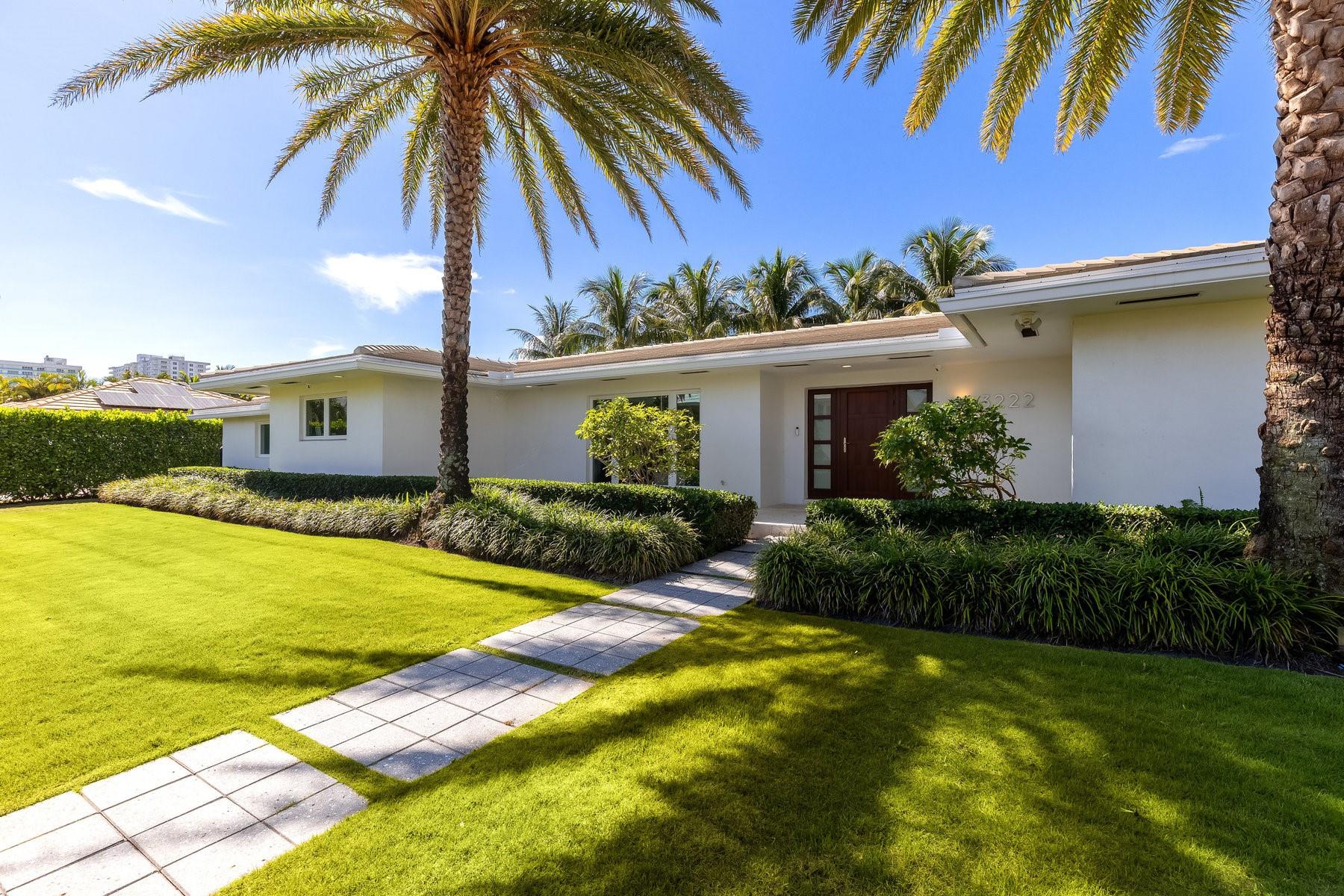 Spectacular renovated deep water home in prestigious gated community. This luxurious 4 bedroom, 5 bath home and maid’s quarters has a sleek custom kitchen with banquette, Thermador appliances, white marble island and countertops and white marble floors. 3,534 Total sq ft, sits on a 14,136 sq ft corner lot and has the coveted south east exposure. Top of the line impact doors/windows, New roof in 2018, full house 25 kw generator, built in sound system and cameras. The redesigned pool comes with salt water and heater and is surrounded by lush landscaping. Brand new concrete dock and a @0,000 lb boat lift. Bermuda Riviera is located 2 blocks from the beach and is in the Bayview school district. It is a 10 minute drive to Pinecrest, WA, St. Marks, Cardinal Gibbons and St. Coleman’s schools.