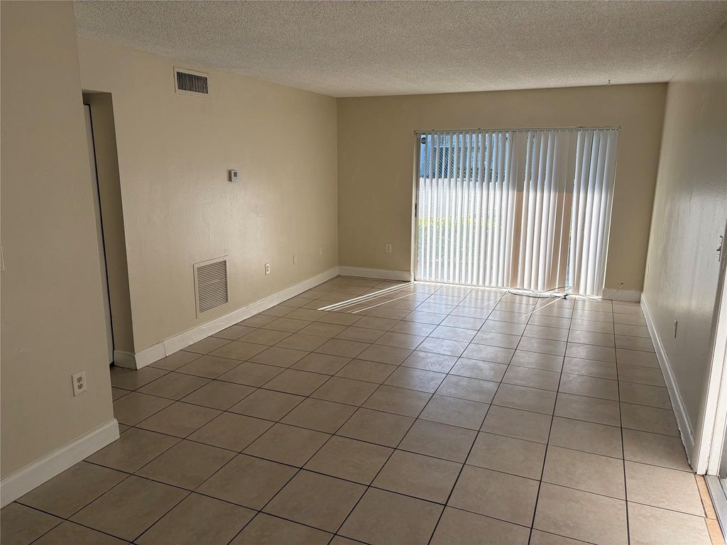 Photo of 405 Executive Center Drive #113, West Palm Beach, FL 33401 (MLS # F10550192)