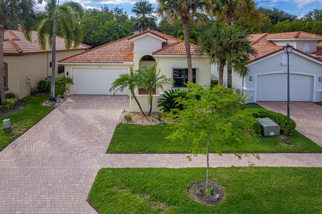 Photo of 9720 Isles Cay Drive, Delray Beach, FL 33446 (MLS # R11133836)