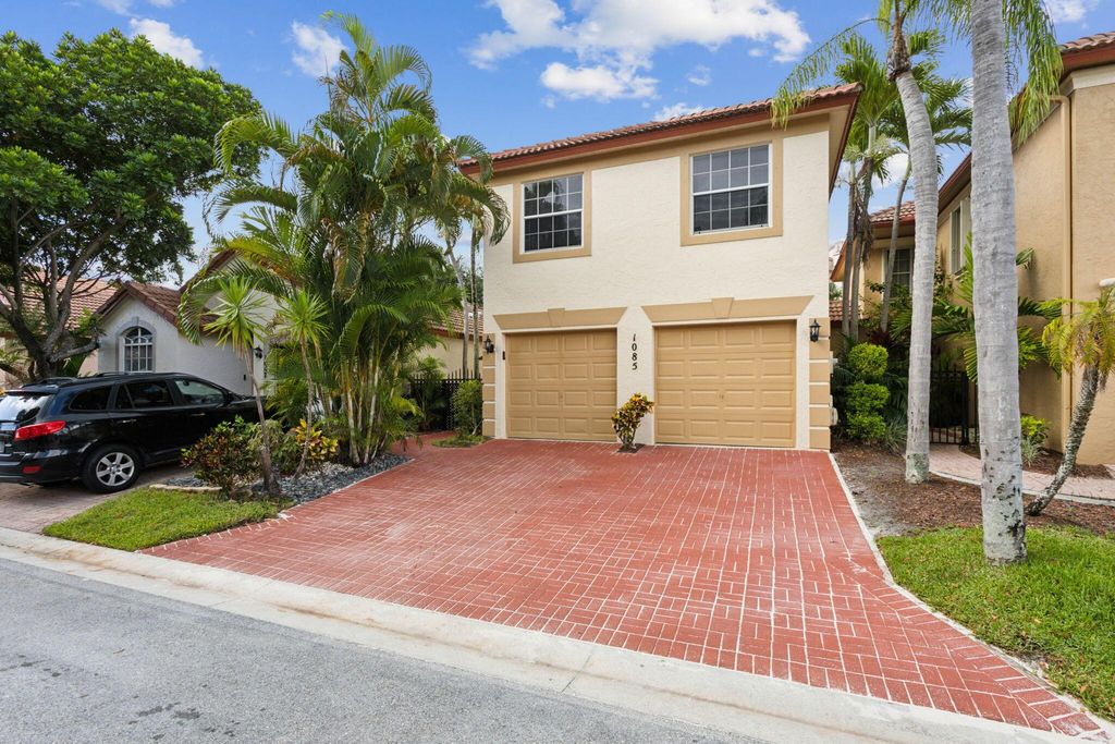 Photo of 1085 Via Jardin, Riviera Beach, FL 33418 (MLS # R11001913)
