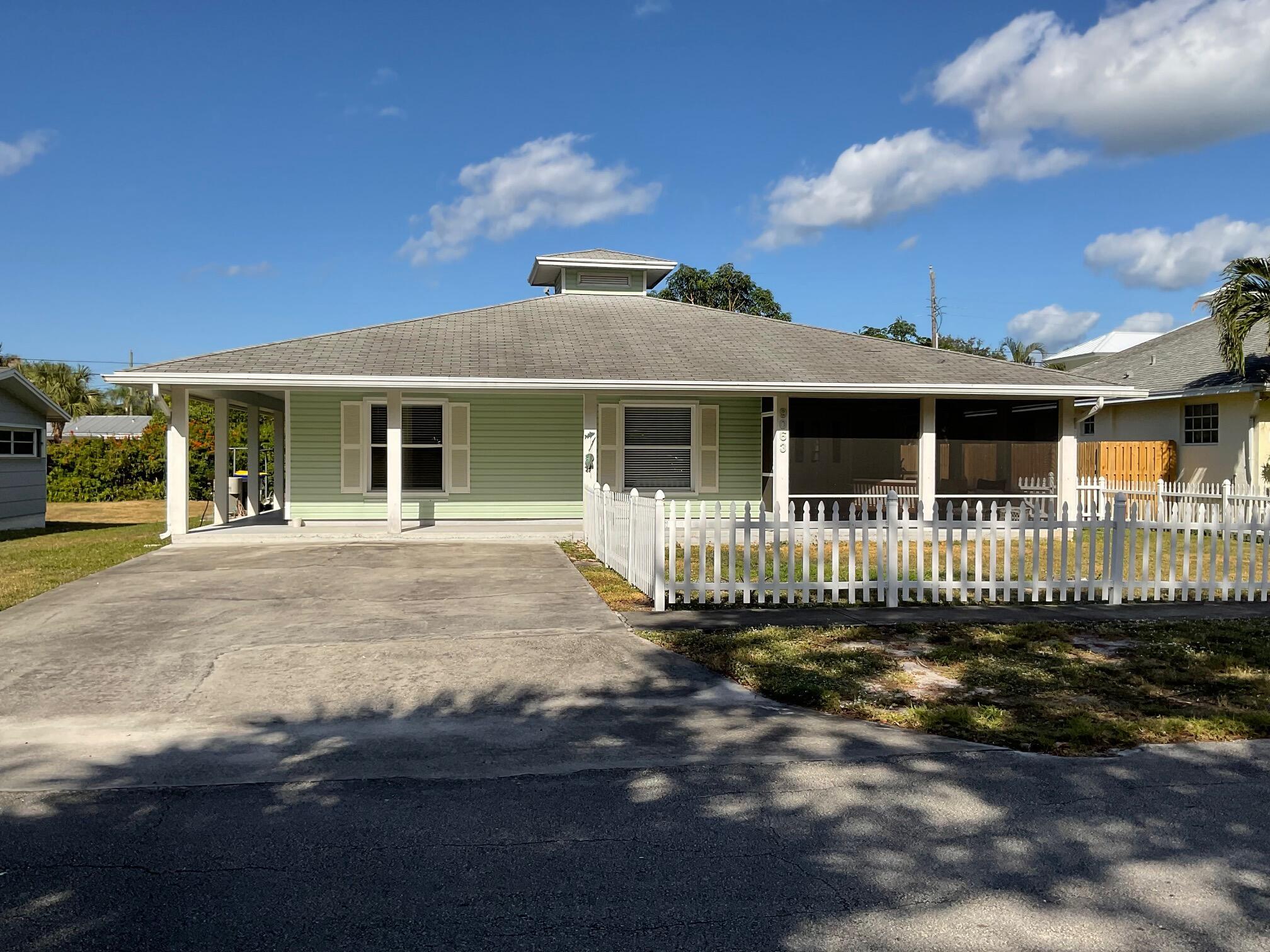 ''The Park House''- 2 bedroom, 2 bath home with tile floors throughout, and vaulted ceilings. Enjoy the direct views of the lush, tree lined circular Zeus Park. Enjoy your morning coffee or unwind on the screened porch overlooking the green space. Just a short walk to downtown Hobe Sound, with shops, dining and local attractions. Flexible rental terms with a 30 day minimum during summer and 90 day minumum for season. Dont miss this rare opportunity to experience relaxed coastal living in Hobe Sound's prime location.