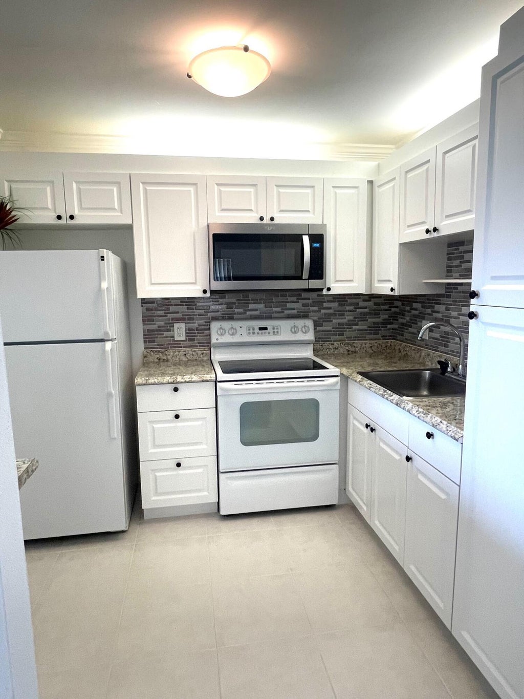 Photo of 114 Valencia E, Delray Beach, FL 33446 (MLS # B26075020)