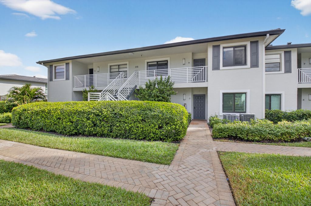 Photo of 23 Southport Lane, Unit D Ln, Boynton Beach, FL 33436 (MLS # R11164213)