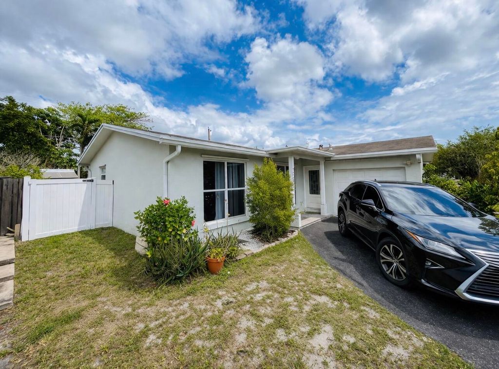 Photo of 11361 NW 32nd Place, Sunrise, FL 33323 (MLS # B26010029)