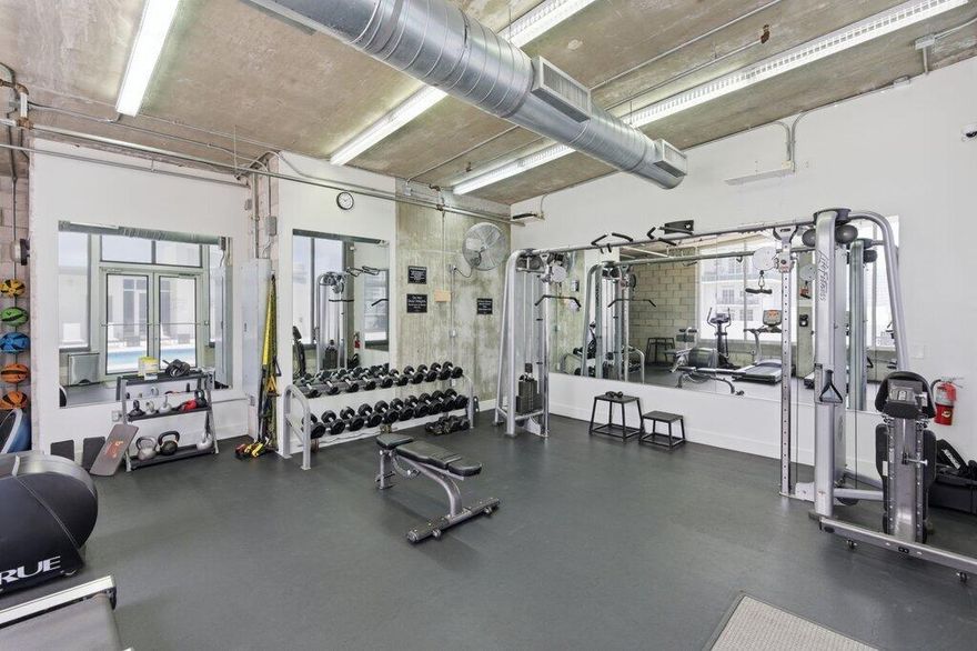 The most exceptional loft available in Fort Lauderdale, where industrial design meets modern living. This bright corner unit is flooded with natural light from expansive impact windows and features soaring ceilings, exposed ductwork, concrete block accents, and sleek finished floors throughout. The open-concept layout creates a true loft experience. Step outside to your oversized private terrace an incredibly rare find perfect for entertaining, outdoor dining, or your own garden retreat. Prime Flagler Village location just 2 blocks from Brightline and minutes to downtown and FAT Village. Building features completed exterior renovations, waterproofing, plus a rooftop pool and fitness center with skyline views.  Seller has never occupied property, so there are no sellers disclosures.