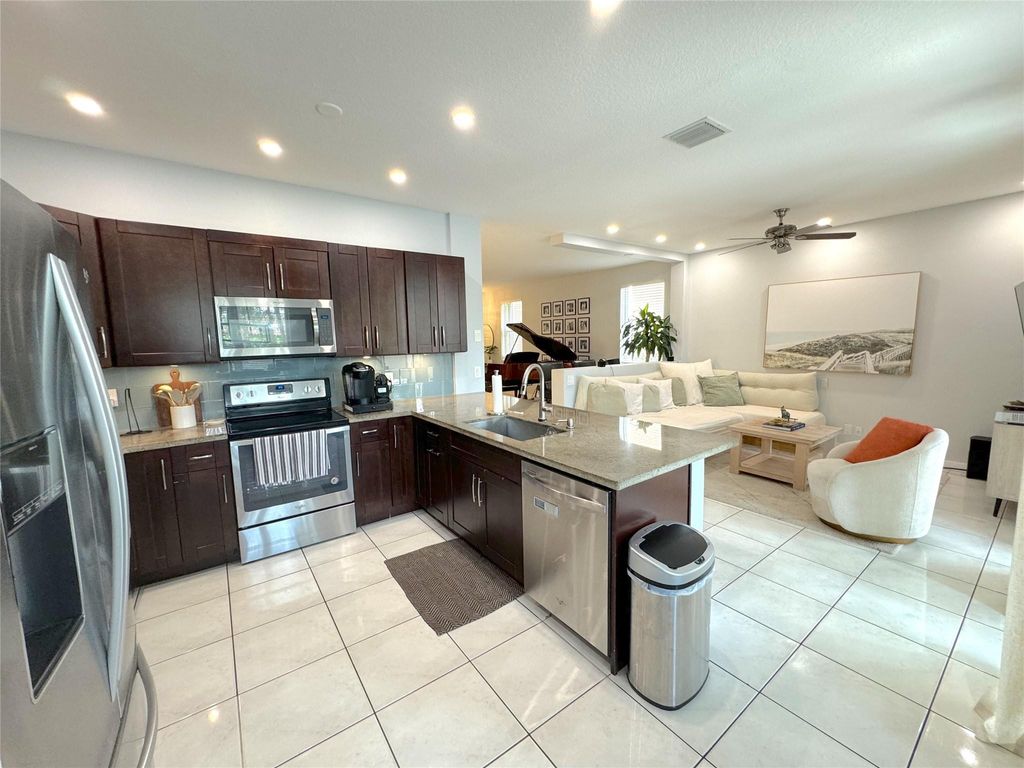 Photo of 143 NW 107th Terrace, Plantation, FL 33324 (MLS # B26040758)
