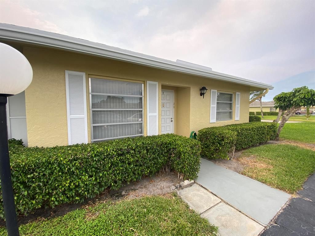 Photo of 2401 Papaya Drive #D, Delray Beach, FL 33445 (MLS # R10720698)