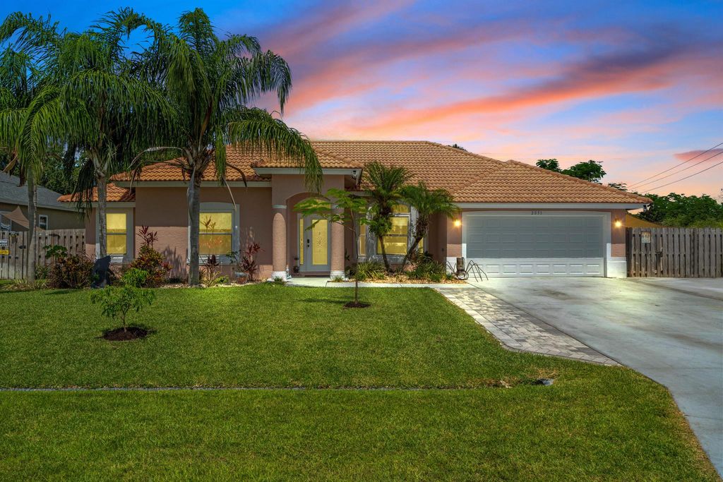 Photo of 2051 SW Pruitt Street, Port Saint Lucie, FL 34953 (MLS # R11100417)
